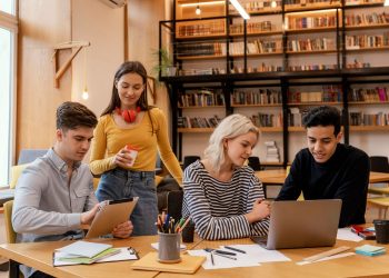 International students studying together in a European university setting, highlighting affordable tuition-free opportunities