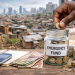 Building an emergency fund on a low income in Africa using small savings, mobile money, and household budgeting