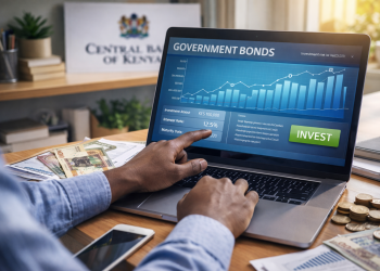 Kenyan investor at a desk using a laptop to invest in government bonds with Kenyan shillings and charts in landscape view