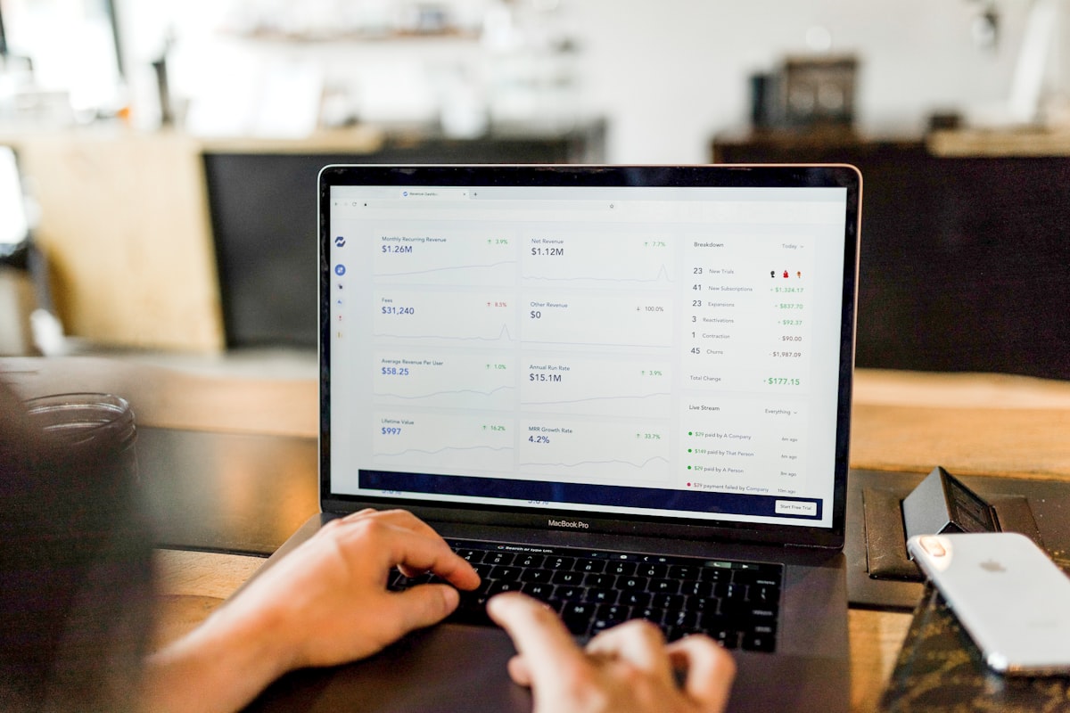 Person working on laptop to make money online with digital tools