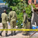 Security personnel at Ggaba nursery school crime scene, Kampala, after the 2026 massacre"