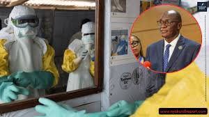 alt="Petition filed to block proposed Ebola quarantine facility in Kenya - Medical workers in PPE and Health CS Aden Duale"