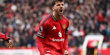 Manchester United player celebrating passionately during a Premier League match ahead of the Sunderland vs Manchester United preview