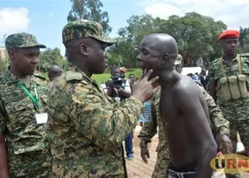 UPDF officers carrying out physical screening during the massive 2026 recruitment drive for 10,200 soldiers
