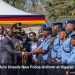 President William Ruto shakes hands with police officers in the new light blue uniform during the unveiling ceremony at Kiganjo Police Training College