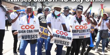 Nurses Call Off 43-Day Strike – nurses holding placards during protest